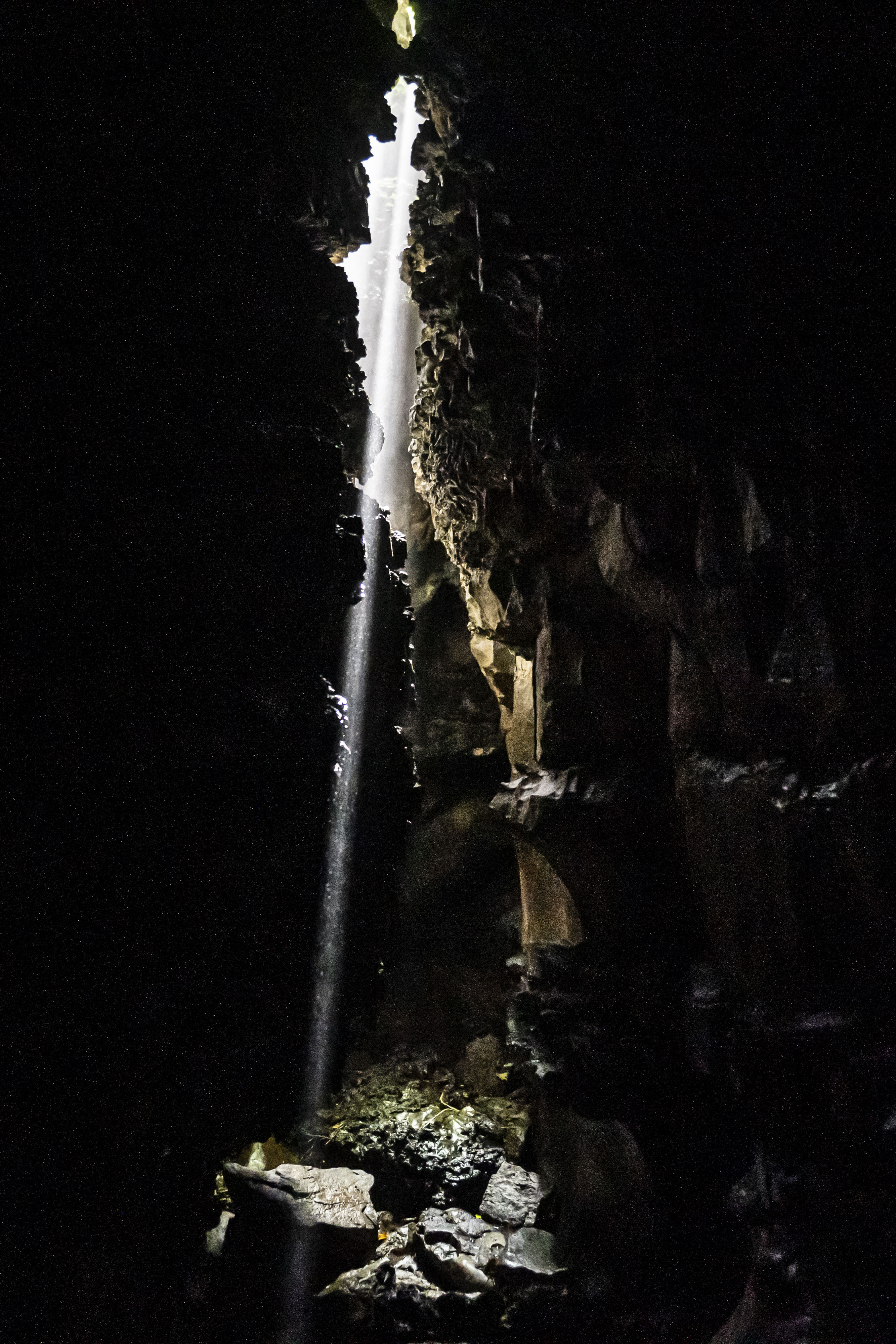 single beam of light entering the cave